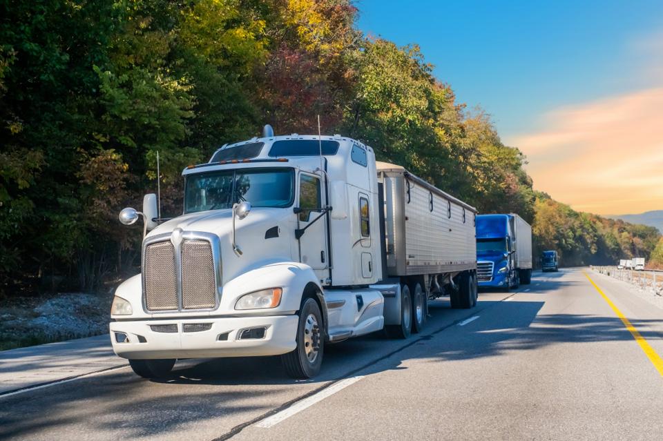 A semi truck on the highway.